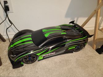Traxxas Xo-1...will do 100mph in 4.9 seconds...I'm trading for a Xmaxx I'm good condition...it must have good body