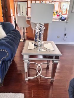 Three piece of coffee and end tables