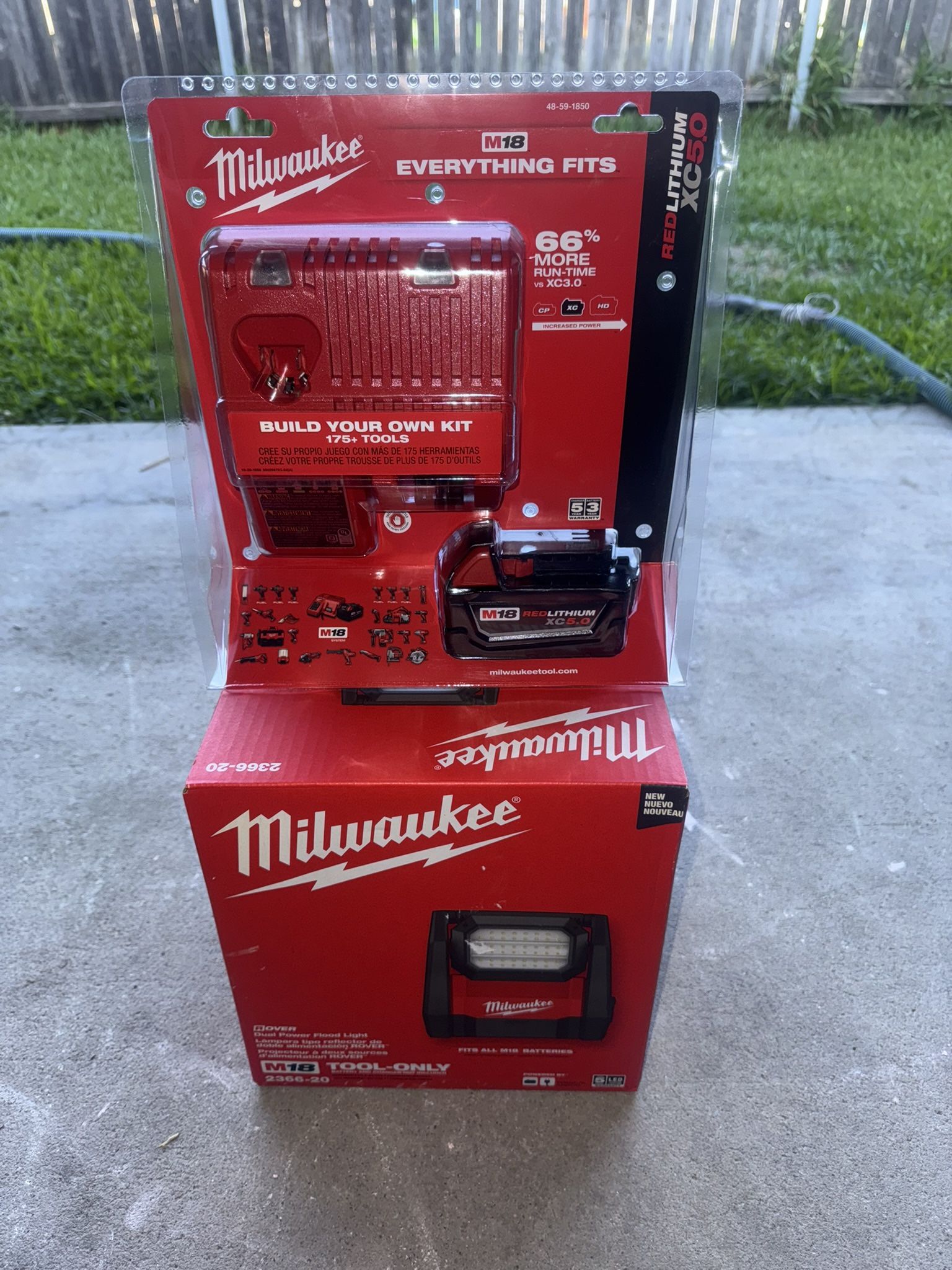 Brand new M18 GEN 2 18 Volt Lithium Ion Cordless ROVER LED AC/DC Flood Light and Starter Kit with (1) 5.0 Ah Battery and Charger