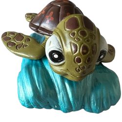 Disney Pixar Finding Nemo Squirt Baby Turtle Tan PVC Figure Cake Topper Water  This Disney Pixar Finding Nemo Squirt baby turtle figure is perfect for