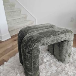 Green upholstered ottoman