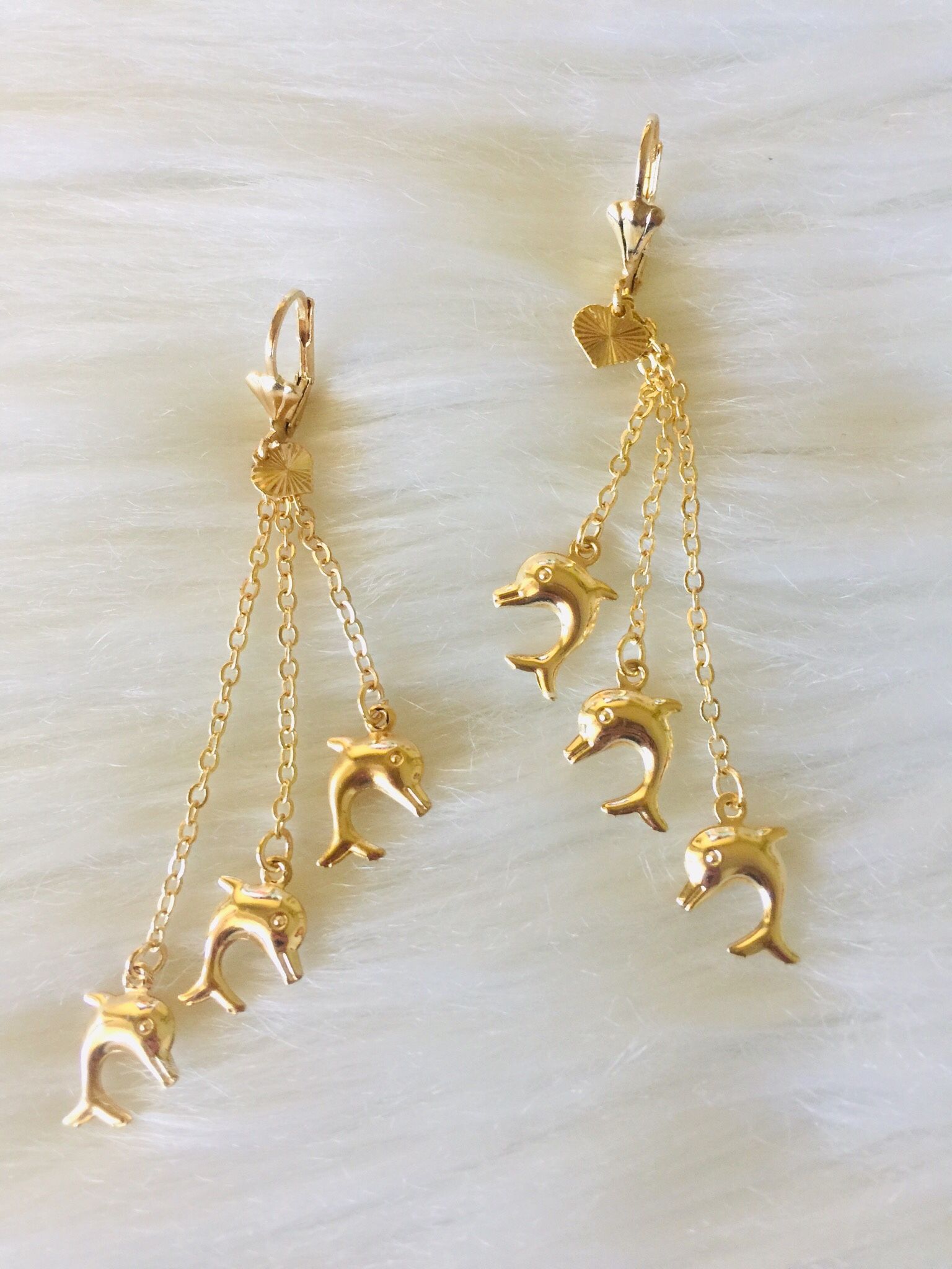 Earrings Dolphins gold plated . Aretes Delfines oro lmainado