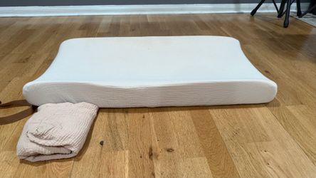 Munchkin changing pad with Mushie Covers