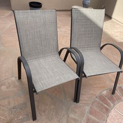 Stackable Outdoor Sling Patio Dining Chairs (set of 2) Gray. Excellent Condition! Cash And Pickup In Ahwatukee Only ! If U See Post Is Available.