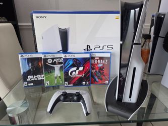 PLAYSTATION 5 SLIM DISK CON 4 JUEGOS A ELEGIR + BASE DE CARGA Y UN MANDO