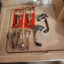 2 Door Handles And 4 Window Cranks 