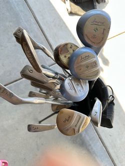 Golf clubs, bag and practice balls