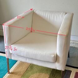 White Fabric Covered Chair
