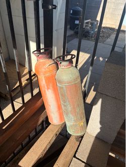 Old brass fire extinguisher’s