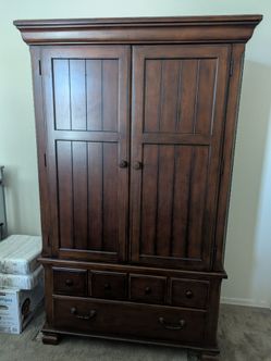 Dark Wood Armoire with Drawers
