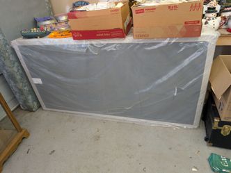 2 Twin Box Springs, one still in plastic