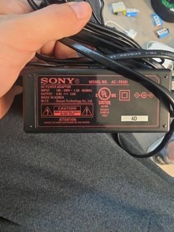 Genuine OEM Sony AC-FX110 AC Adapter Charger 9.5V Power Supply