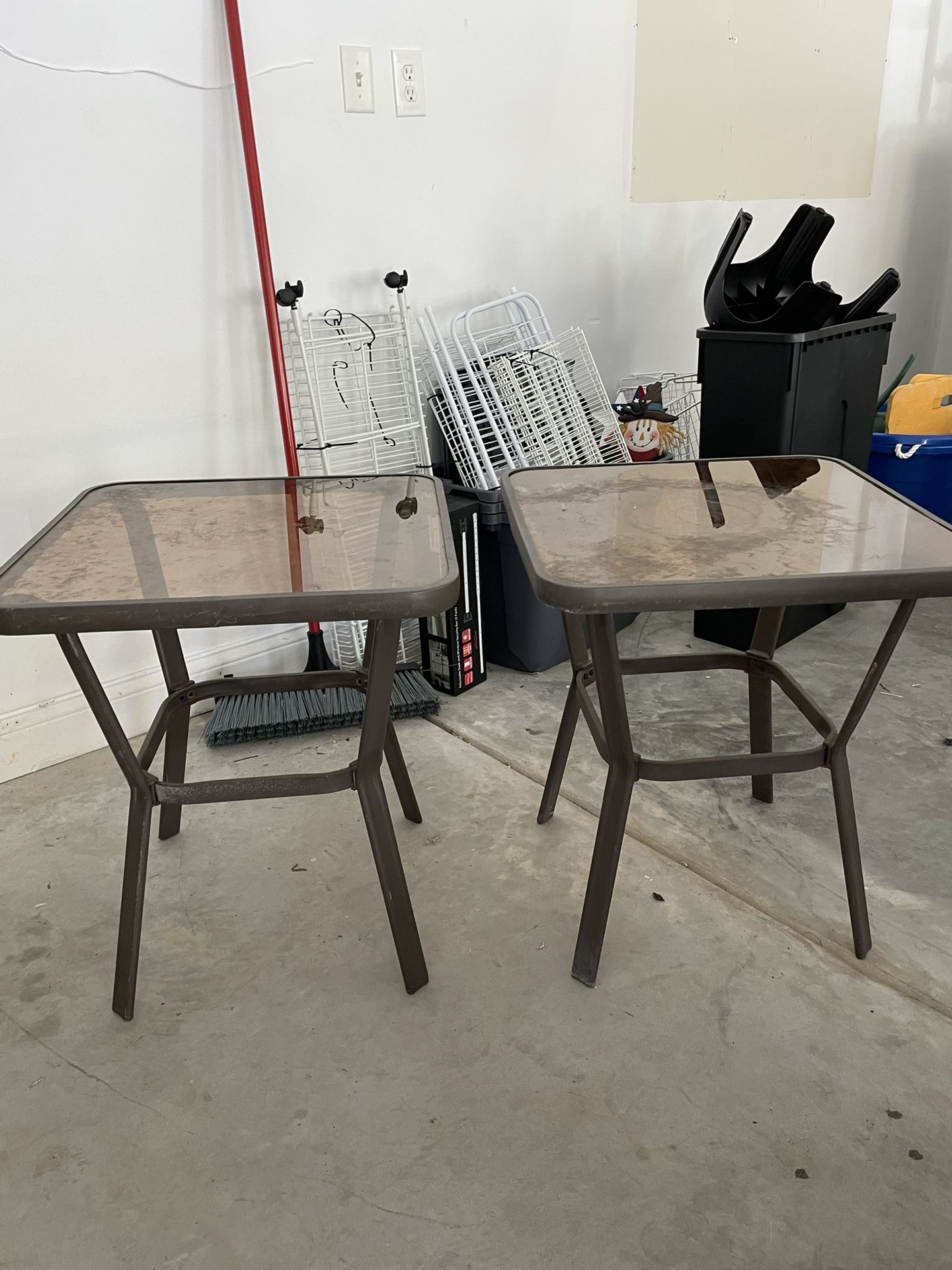 Set Of Two Glass And Metal Outdoor Patio Tables