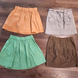4 Short Skirts with Pockets, 3 Banana Republic, J. Crew , size 6, good condition 