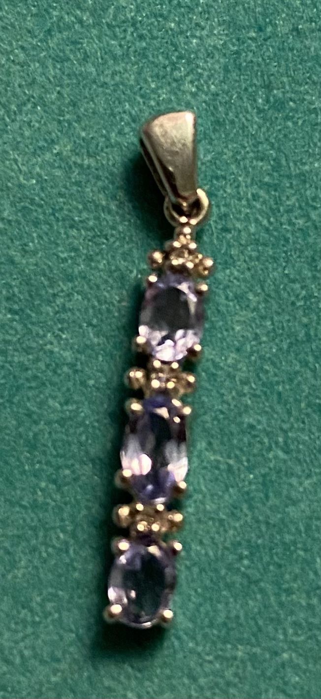 3 Stone Tanzanite And 10 K Pendant