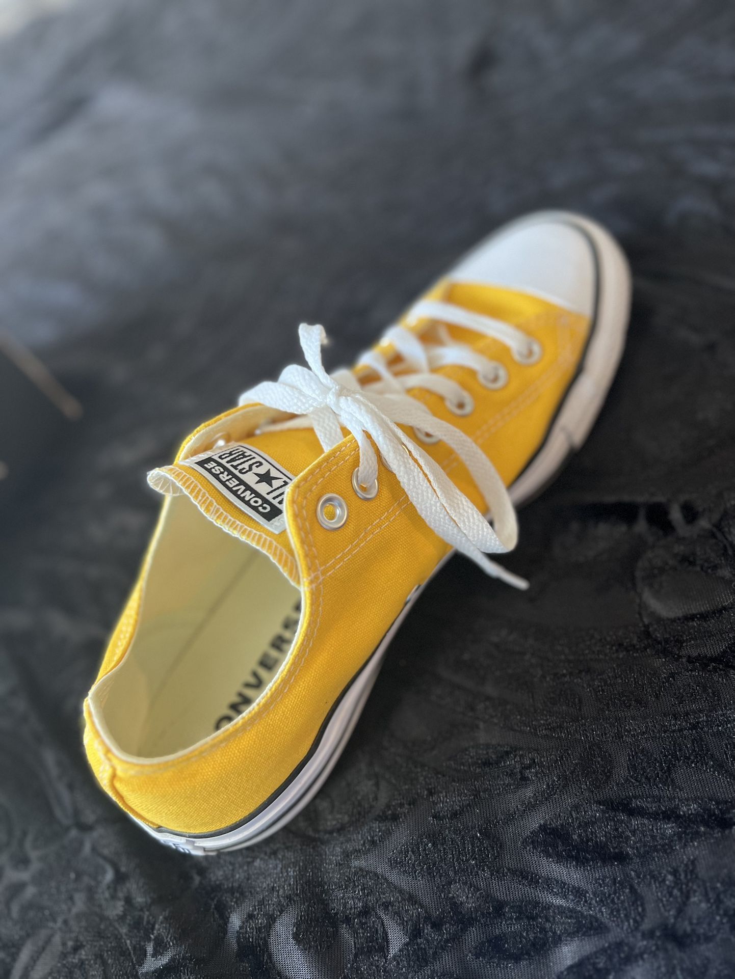 Yellow converse 