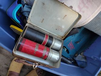 Vintage green lunch container with two thermoses one I see hot and one thermos