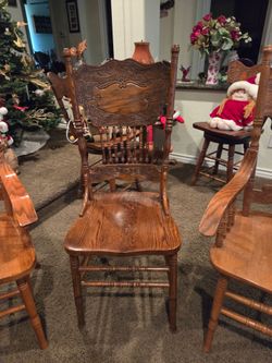 Chairs oak set of four two captain chairs, two regular chairs, all perfect, very heavy
