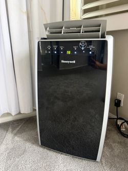 Honeywell MN10CES Portable Air Conditioner, 10,000 BTU Cooling, with Dehumidifier & Fan (Black-Silver)