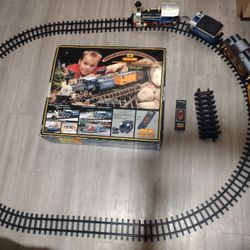 THE GREAT IRON SPIKE EXPRESS CHRISTMAS TRAIN WITH REMOTE CONTROL