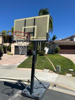 FREE Spalding basketball hoop. Adjustable.