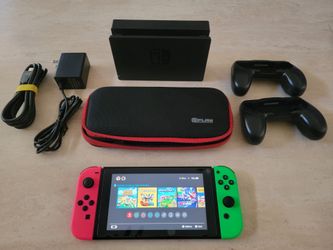 Nintendo Switch with Dock, Case, Charger, HDMI, Memory Card, and Games $149