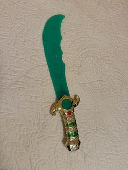 Halloween costume accessory gold green sword pirate press button, makes noise