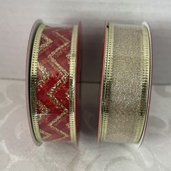  The product is a set of two Merry Brite Christmas wired edge ribbons, each measuring 7/8" wide and 3 yards long. The ribbons are in a festive gold an