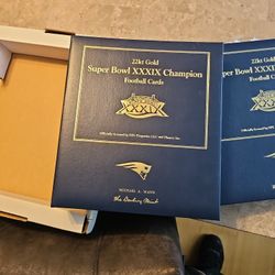 Twenty two carrot gold super bowl, thirty nine championship football cards