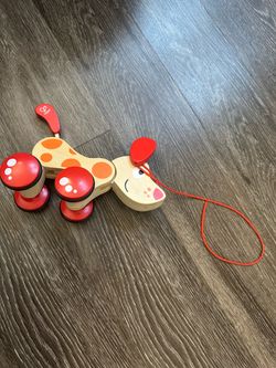 Hape puppy wooden pull toy