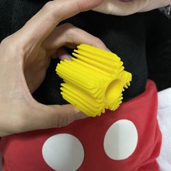 Yellow snowflake dog toy