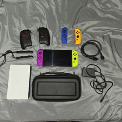 Nintendo Switch OLED Model  With 4 Joycon Controllers And Hori Split Plus Carrying Case