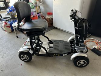 4 Wheel Foldable Chair For Sale!!!