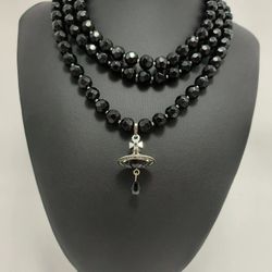 Brand new three-layer black chain silver pendant necklace.