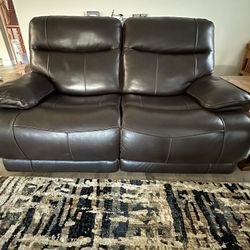 Two Seat Leather Reclining Sofa