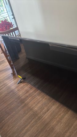 Large Flat Screen TV with Stand