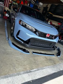 Aerodynamics front lip and side skirt