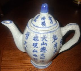 Oriental Asian Blue Crackle Mini Teapot Ceramic 5” with Intricate Chinese calligraphy.
Excellent Condition