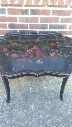 Belk Brothers black table flower mural painted on top