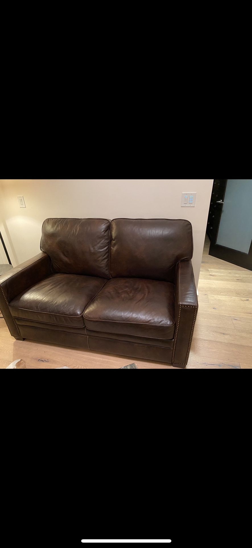 100% leather love seat couch