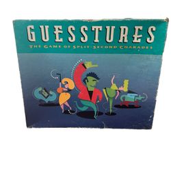 Milton Bradley Ghestures The Game of Split Second Charades 0 1990  Instructions included. Only misses the crayon. Looking for a fun and fast