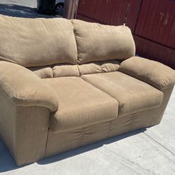Ashley’s furniture Love seat couch sofa 2 seater Light Brown Great condition