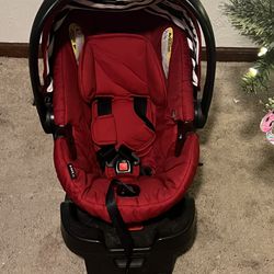 Red Britax safe cell carrier 