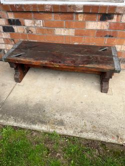 Rustic Wooden Bench with Metal Hardware