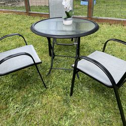 patio set, tand three comfortable chairs, good condition
