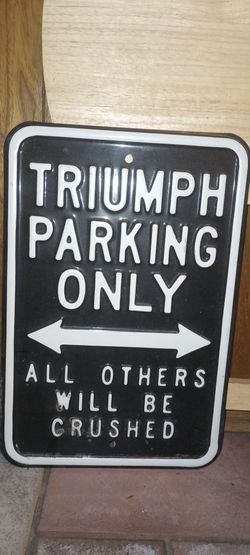 Triumph Sign
