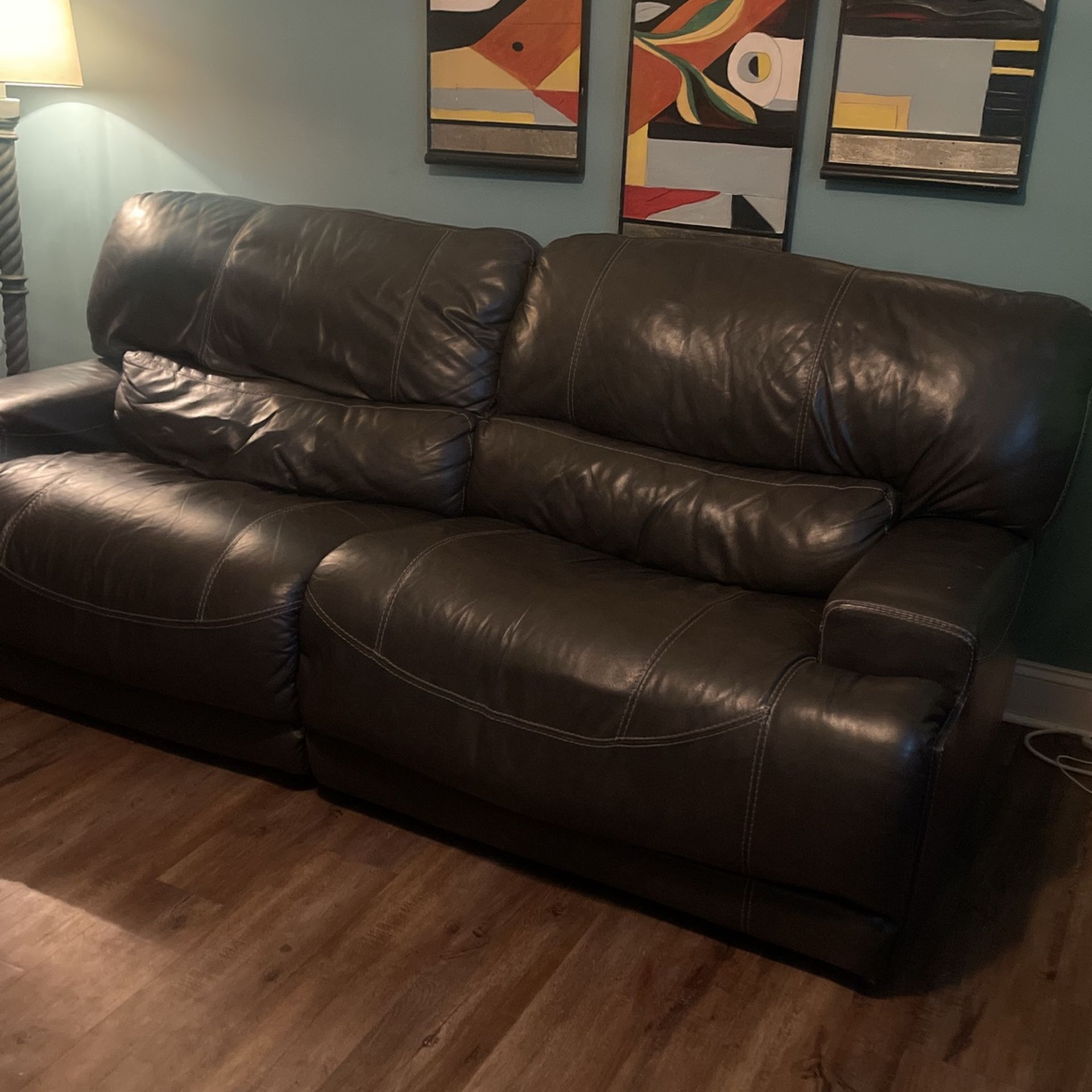 Leather couch and loveseat recliner