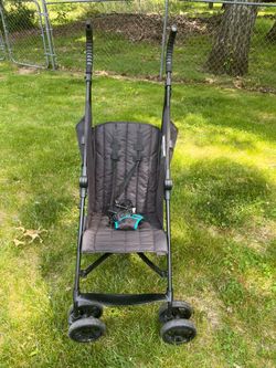 Lightweight black stroller with harness $30 Cash only. Cross posted