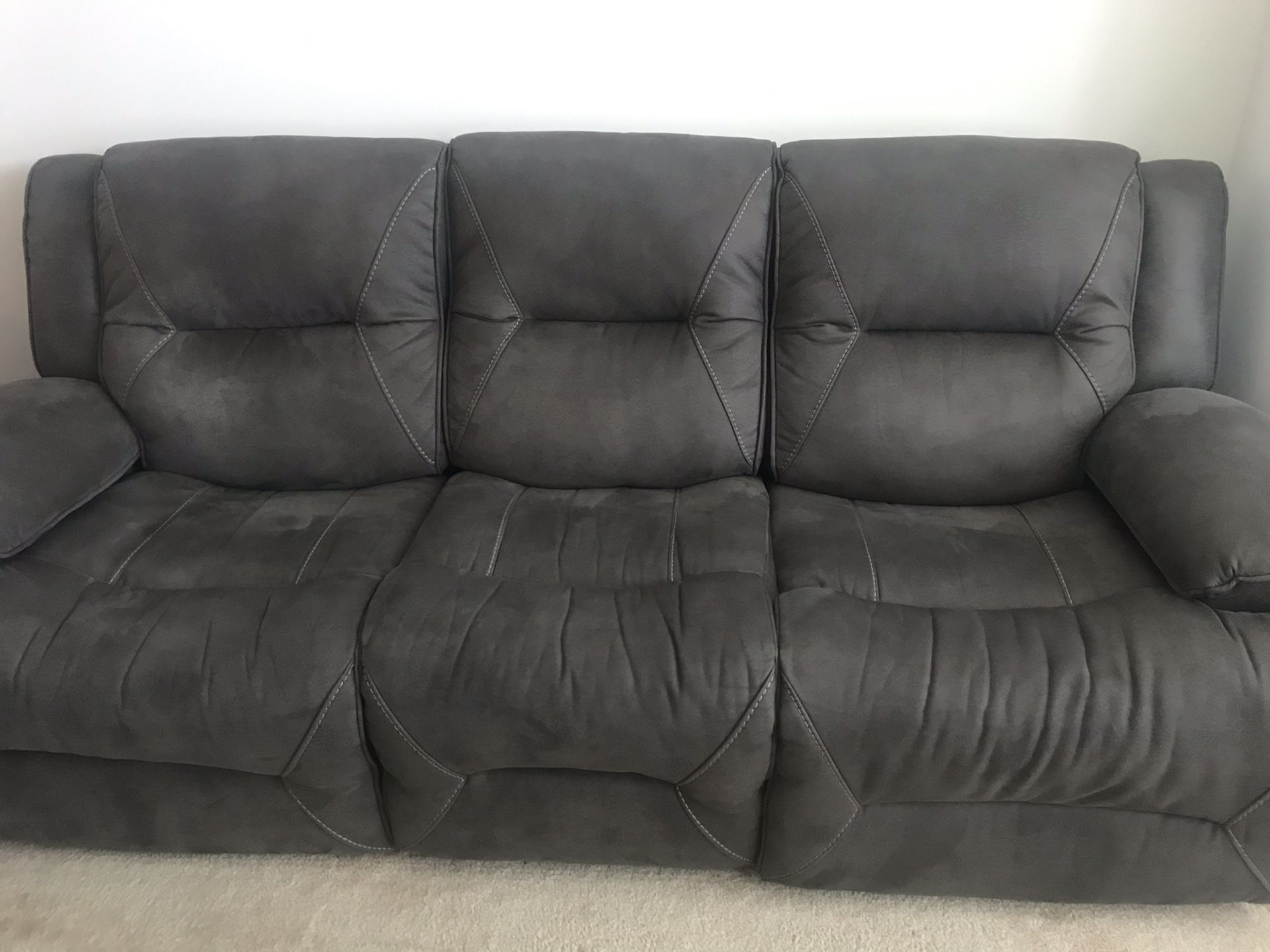 Super comfortable reclining sofa, dark grey suede