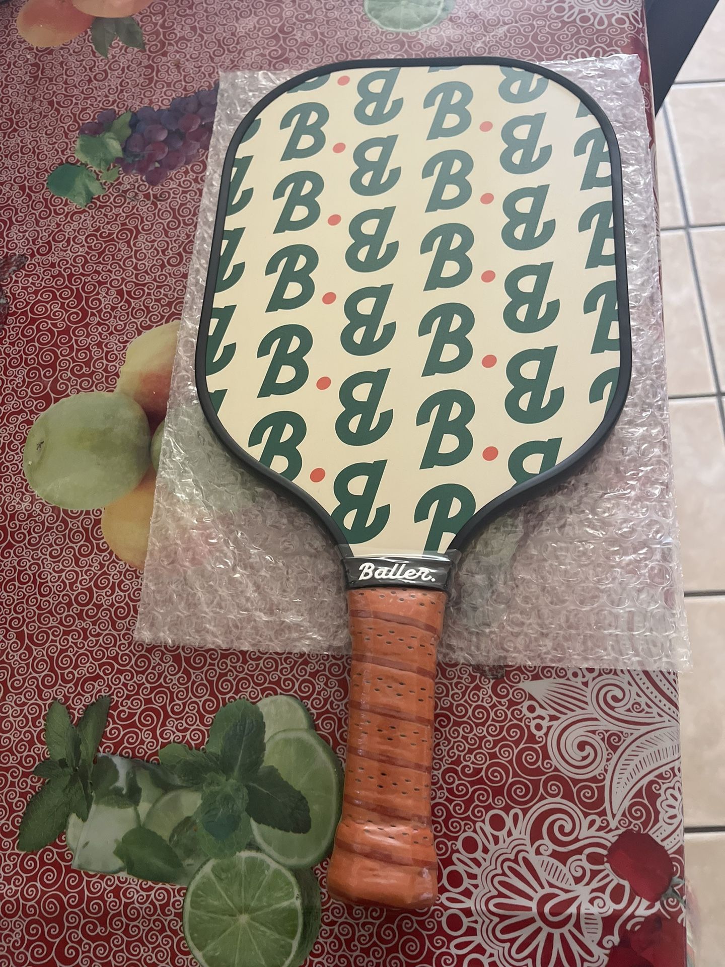 Baller. Pickle Ball Paddle and 3 Balls